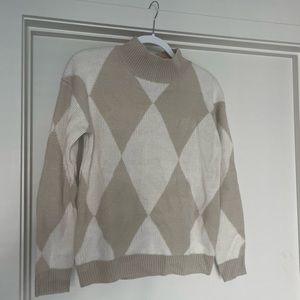 Beige and white checkered sweater